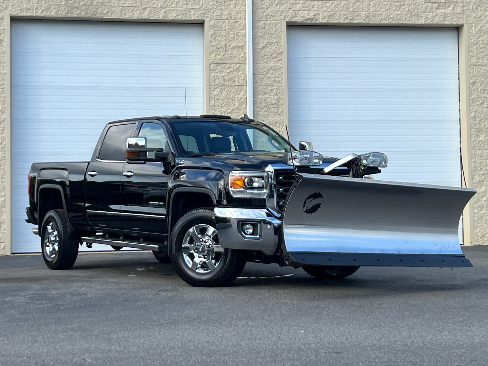 2018 GMC Sierra 2500HD SLT with Fisher Plow 1