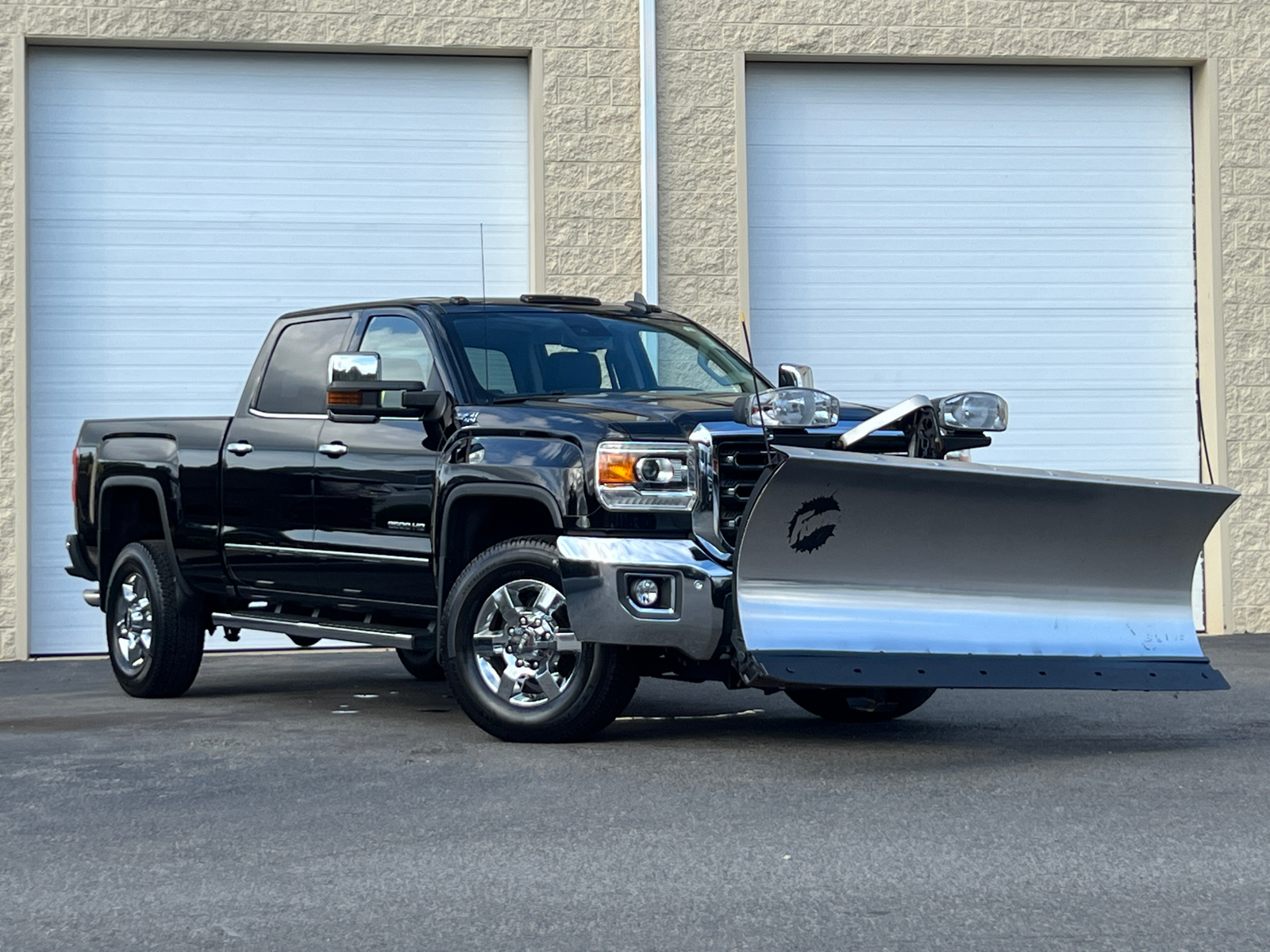 2018 GMC Sierra 2500HD SLT with Fisher Plow 2