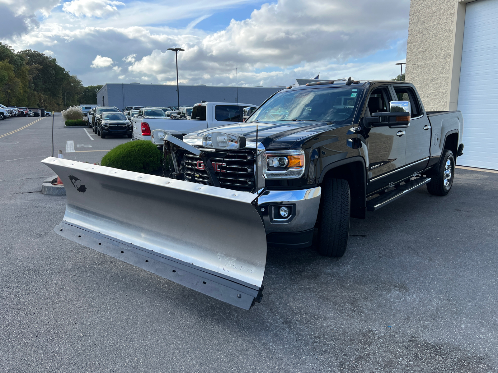 2018 GMC Sierra 2500HD SLT with Fisher Plow 4