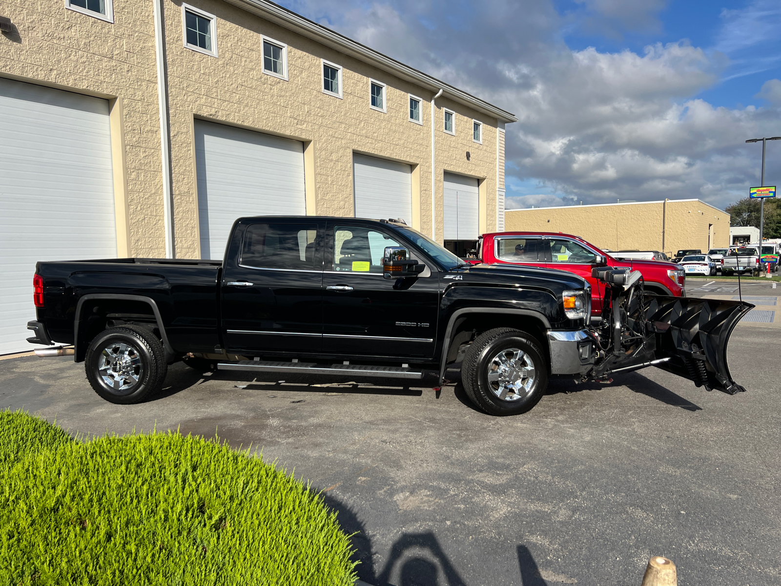 2018 GMC Sierra 2500HD SLT with Fisher Plow 12