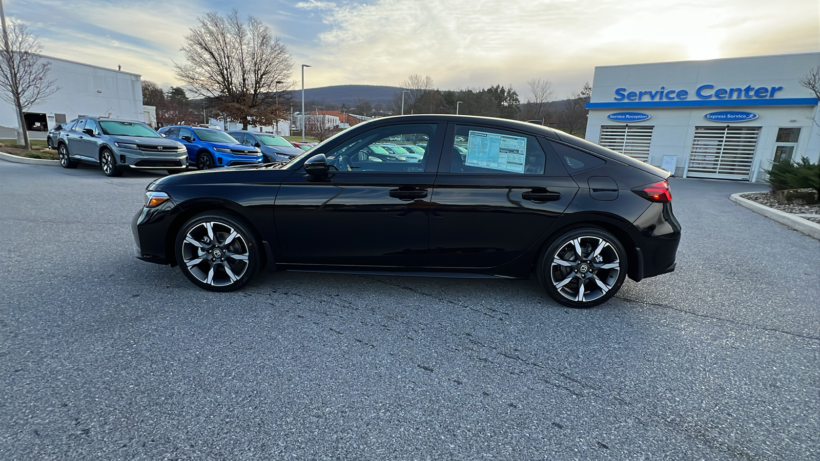 2025 Honda Civic Hybrid Sport Touring 7