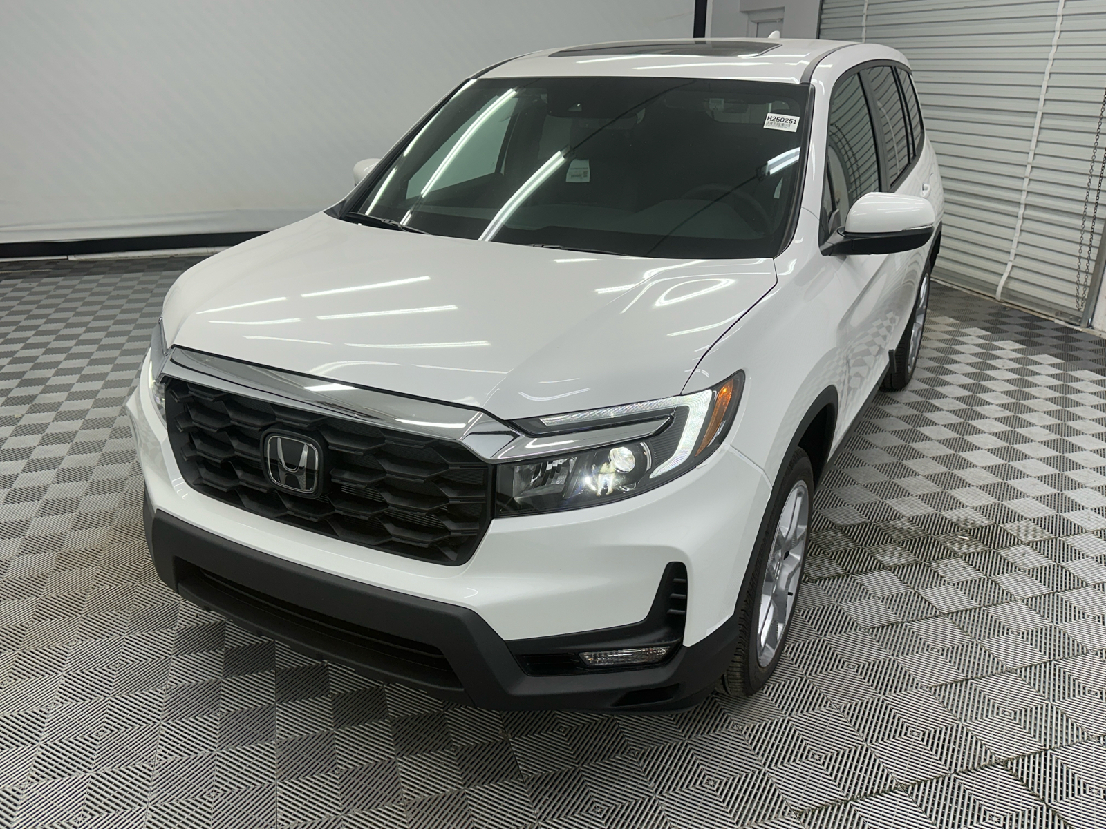 2025 Honda Passport EX-L 1