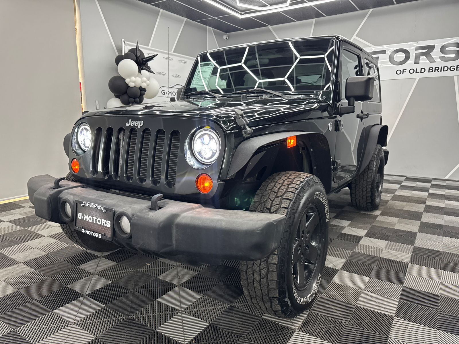 2012 Jeep Wrangler Sport SUV 2D 1