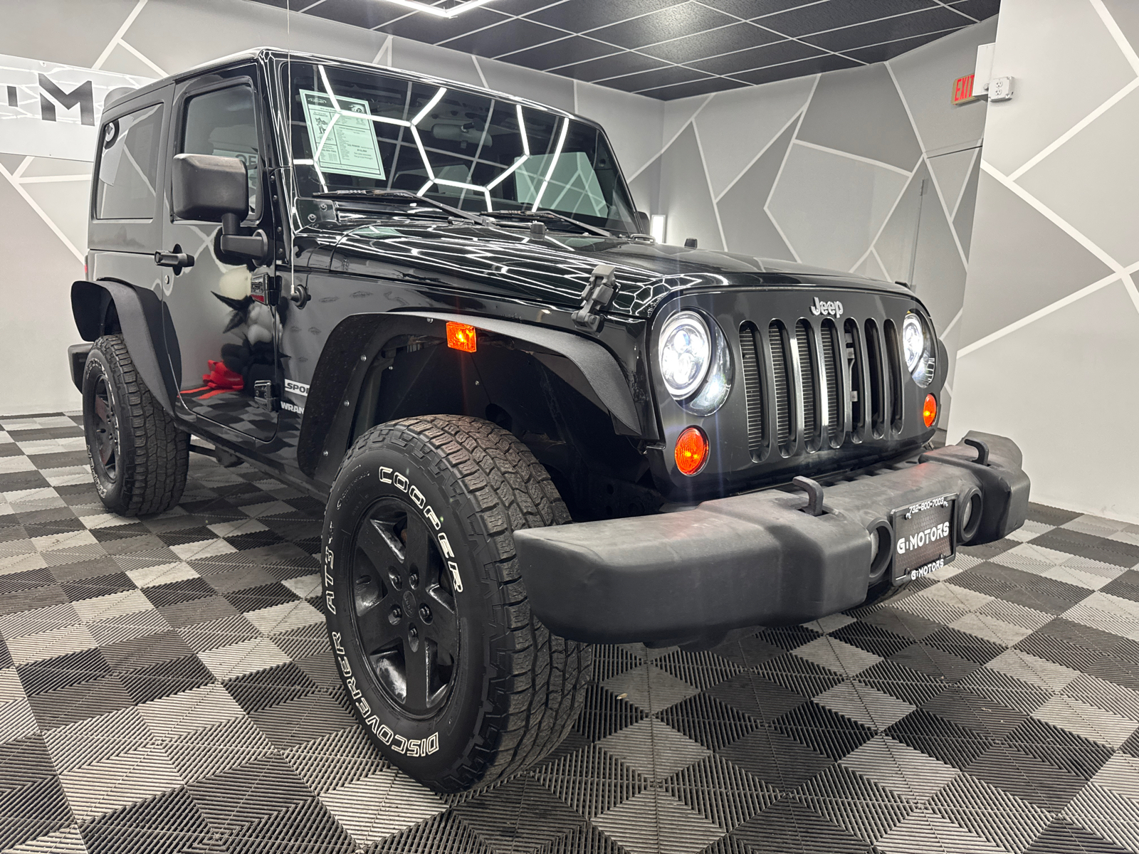 2012 Jeep Wrangler Sport SUV 2D 13