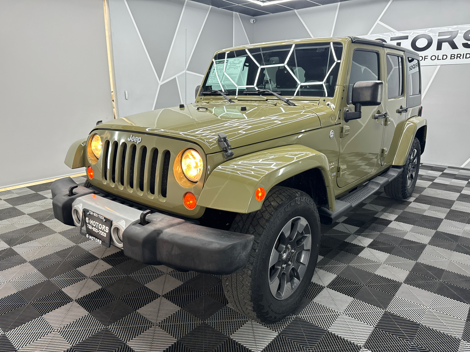 2013 Jeep Wrangler Unlimited Sahara Sport Utility 4D 1