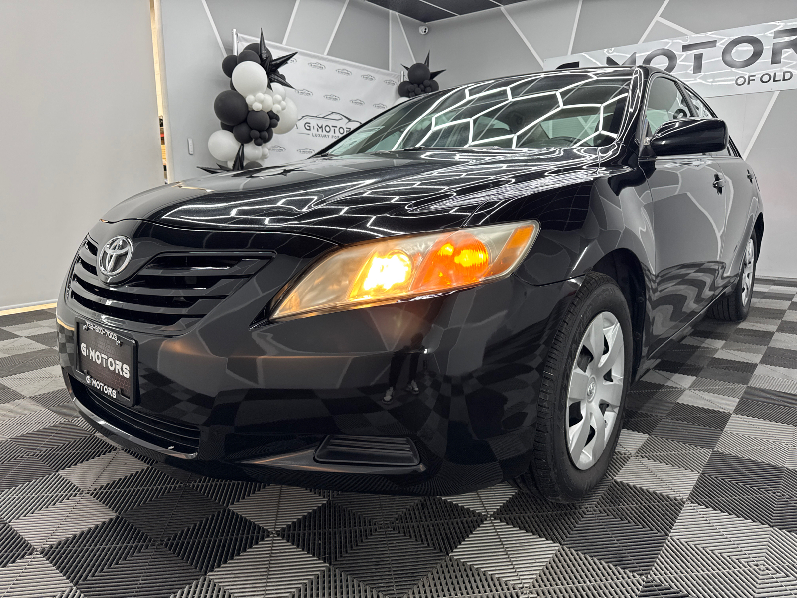 2009 Toyota Camry LE Sedan 4D 1