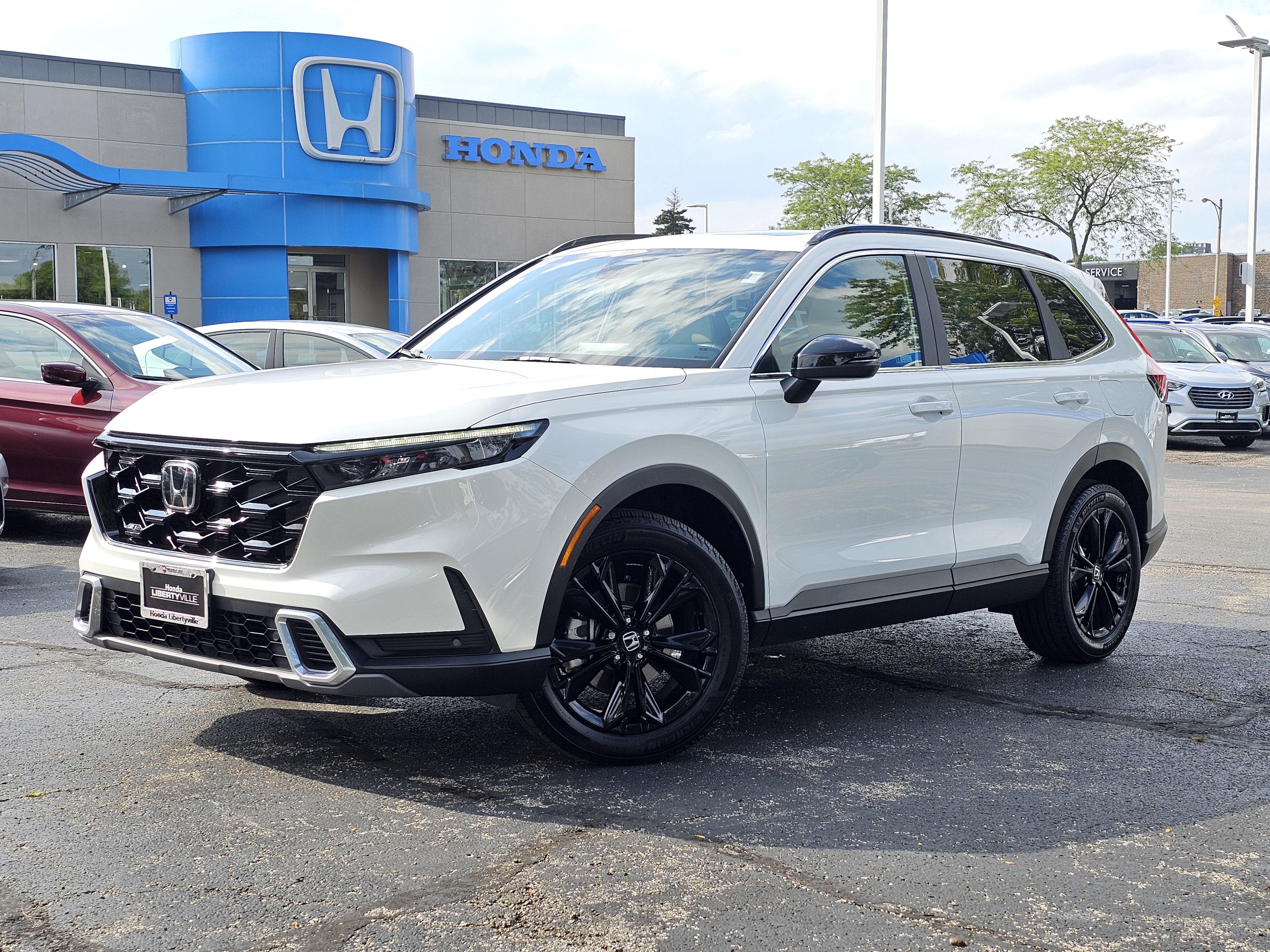 2023 Honda CR-V Hybrid Sport Touring 1