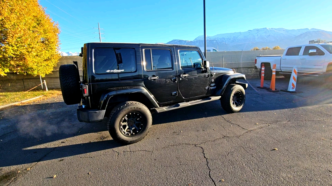 2011 Jeep Wrangler Unlimited Sahara 4